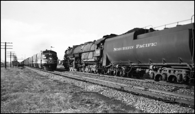 NP 5115, 4-6-6-4 Challenger Class Z-6 west bound meets diesel powered extra at DeSmet, MT.