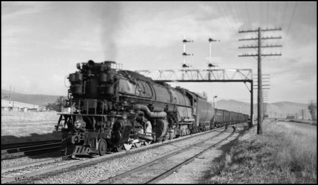 NP 5115, 4-6-6-4 Challenger Class Z-6 west bound passing under semaphores at DeSmet, MT.