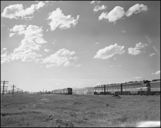 An extra east bound freight meets the second No.1 NCL at Missoula, MT.