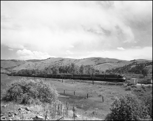 NP 7004, EMD F-9A pulls an extra freight train west at Bradley, MT