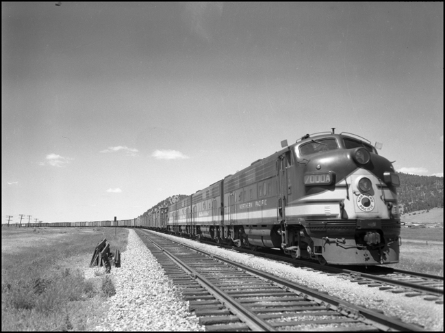 NP 7000, EMD F-9A with east bound extra freight near Placer, MT