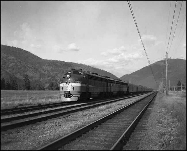 NP Train No. 25, with NP 6501 on the head end near Milltown, MT