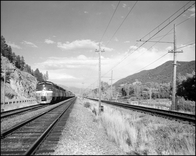 NP train No. 25 near Turah, MT, MP 109.6 between Clinton and Bonner, MT.