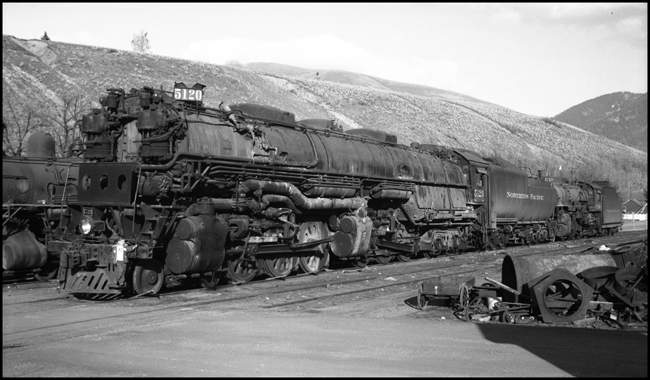 NP 5120, Class Z-6 on storage track at Missoula, MT, with LD Nixon standing on pilot step.