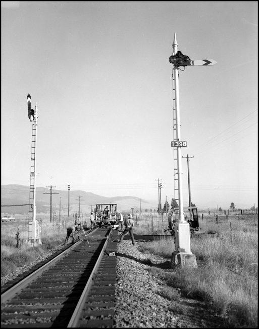Track alignment crew with Jackson track equipment NP 142MS near Frenchtown, MT