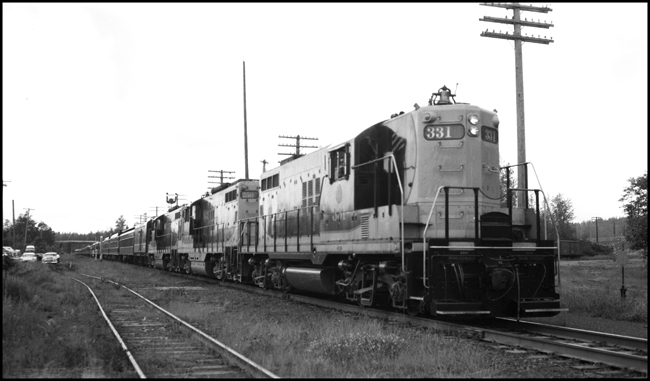 NP 331, EMD GP9 heads up a special passenger train at Kanaskat, WA on a trip to open the line change for the Howard Hansen Dam.