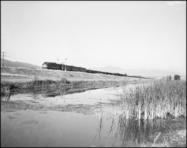 An extra east bound freight train near Frenchtown, MT.