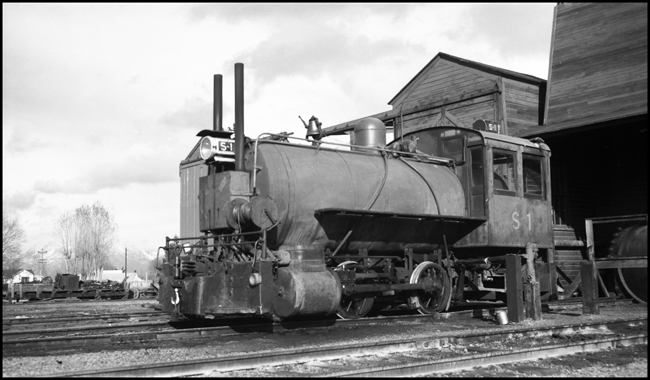 Somers Lumber Company S-1, a fireless steam locomotive attached to steam pipe at Somers, MT.