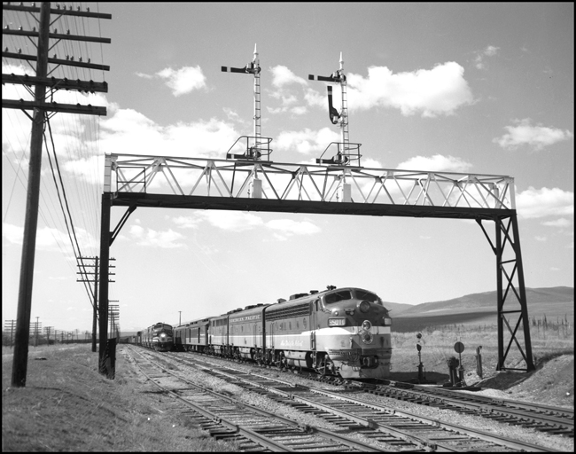 An extra east bound train No. 2, the Mainstreeter, at the signals near DeSmet, MT.