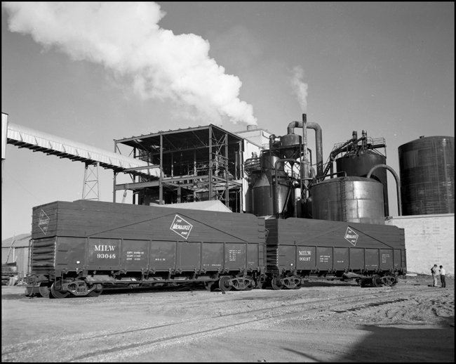 Milwaukee Road open hoppers at the Waldorf Plant at Schilling, MT.