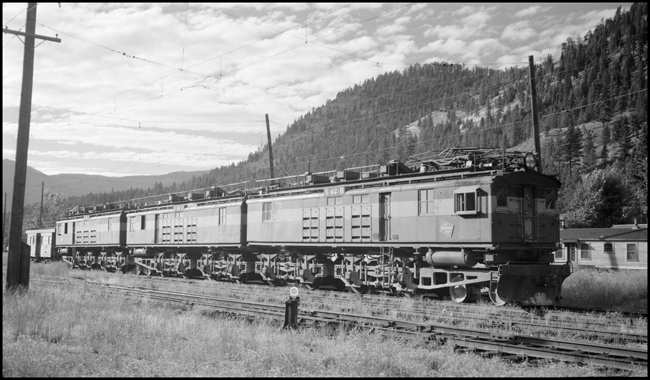 MILW electric locomotive E-42 waiting for activation at Alberton, setting with pantograph arms down. 