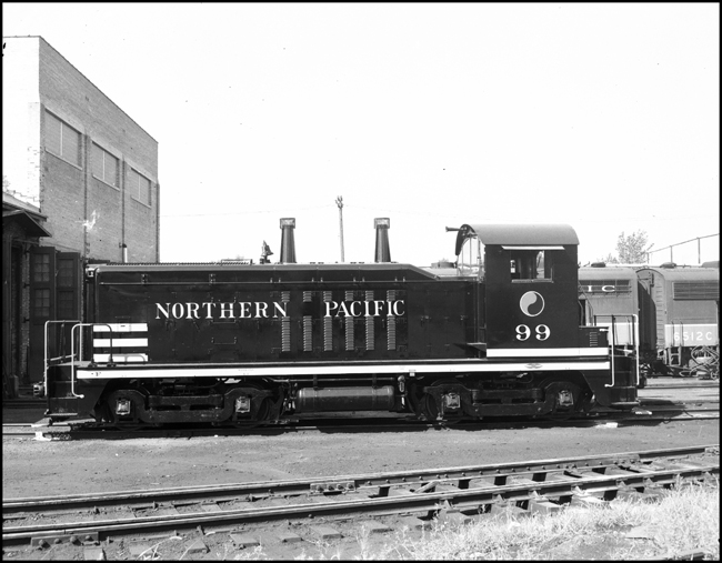 NP DE 99, NW-2 switcher outside of Mississippi Street Diesel Shop in St Paul