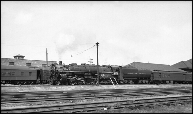 NP 2651, Class A-2 with passenger train at possibly a North Dakota depot