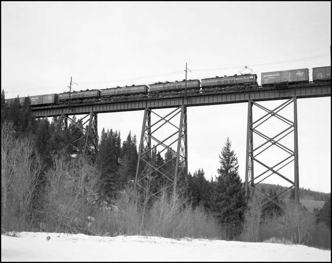 Helper in middle of MILW X E70 E, on bridge near Janney MT