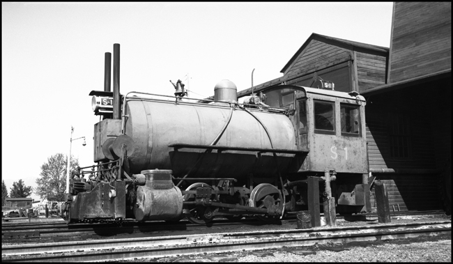 A fireless steamer is missing some components found on regular locomotives.  There is no tender, no firebox, no smokebox, now much of a stack,  and there probably is not a coal scoop back in the cab.  But it still is a steam locomotive