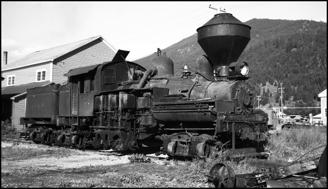 A Lima Shay, the typical logging railroad locomotive, is at rest on the remains of the logging railroad operated by Anaconda, a name that normally evokes thought of copper.  The large smokestack, more typical on a woodburning engine from a previous centurty, has a function on a logging railroad.  It contains a  tight arrangement of wire mesh that will prevent both the escape of most sparks and the resulting forest fire.