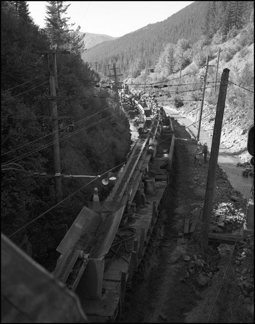 New types of equipment, like multi-level automobile racks and piggyback cars carrying truck trailers meant much work for railroads, especially when tunnels were involved.  A special Matisa work train is at Tunnel 20 in Idaho, helping to carve a higher profiles for the trains of tomorrow.