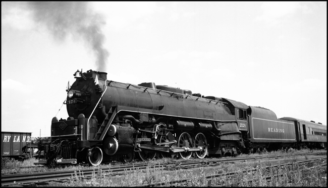 Built for freight service in 1947, but finiding fame on a final fling with special passenger trains called Iron Horse Rambles, The T-1 Northerns of the Reading earned a special place in the hearts of railfans at the end of the steam era.  Here, one of them has brought a passenger extra to a famous and historic location on a Reading branch.