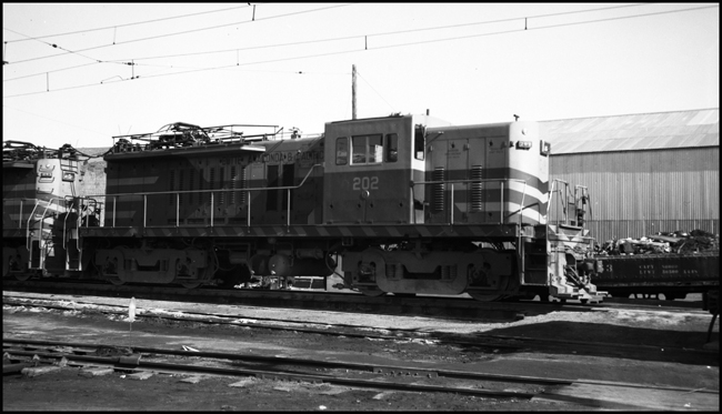 The two newest electric locomotives on the copper hauling Butte, Anaconda & Pacific rest at the engine terminal at Anaconda between runs
