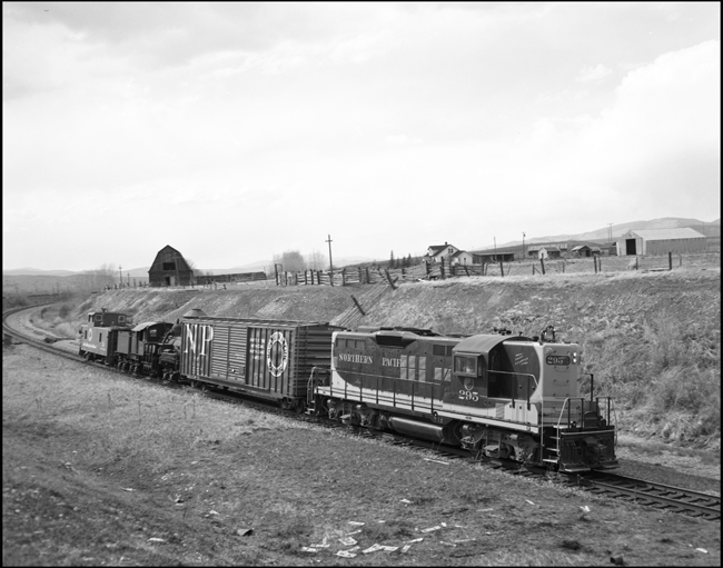 It's a slow journey eastward.  It's always a slow journey when the cargo is unusual or subject to special handling like this Shay steam locomotive.  Most trains needing special handling are moving oversized shipments.  This one is standard railroad equipment, but you can't hurry a Shay.