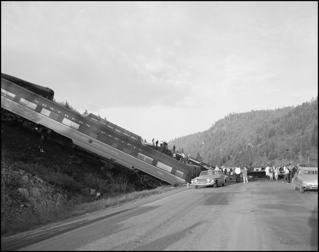 Wreckage of NP dome coach 552.  Train No. 26, the North Coast Limited, derailed 1 mile west of Evaro, MT taking one life.