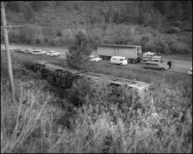 Wreckage of NP locomotives 6510A and 6701B.  Train No. 26, the North Coast Limited, derailed 1 mile west of Evaro, MT taking one life.