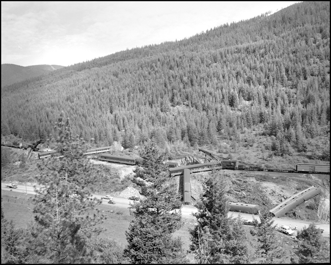 A view of the accident scene form the opposite hill. The North Coast Limited, derailed June 10, 1962 1 mile west of Evaro, MT taking one life.