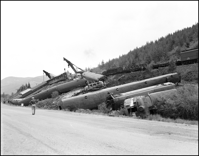 A view of the accident scene form the road. The North Coast Limited, derailed June 10, 1962 1 mile west of Evaro, MT taking one life.