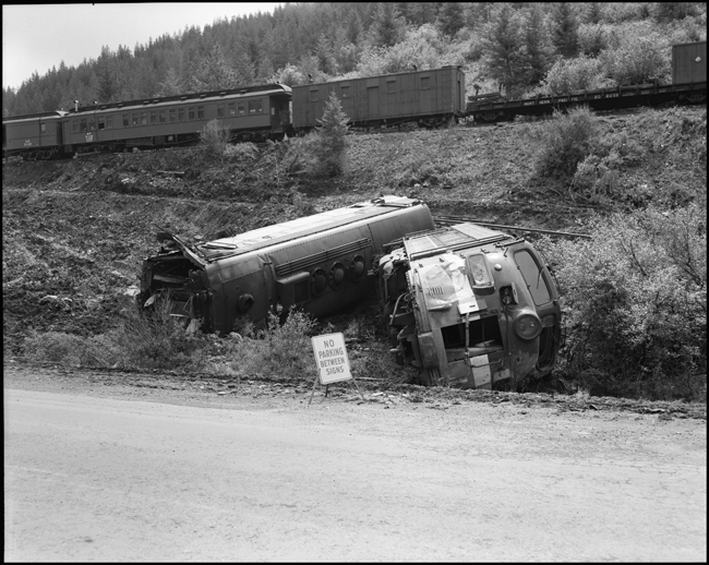 Wreckage of 6701C and 6511A. Train No. 26, The North Coast Limited, derailed June 10, 1962 1 mile west of Evaro, MT taking one life.
