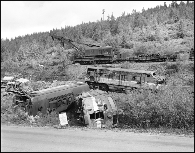 Wreckage of 6701C, 6511A and 6510A. Train No. 26, The North Coast Limited, derailed June 10, 1962 1 mile west of Evaro, MT taking one life.