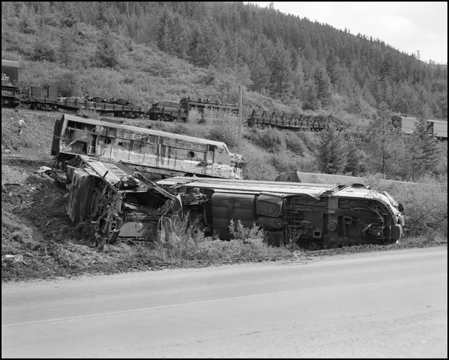 Wreckage of 6701C, 6511A and 6510A. Train No. 26, The North Coast Limited, derailed June 10, 1962 1 mile west of Evaro, MT taking one life.