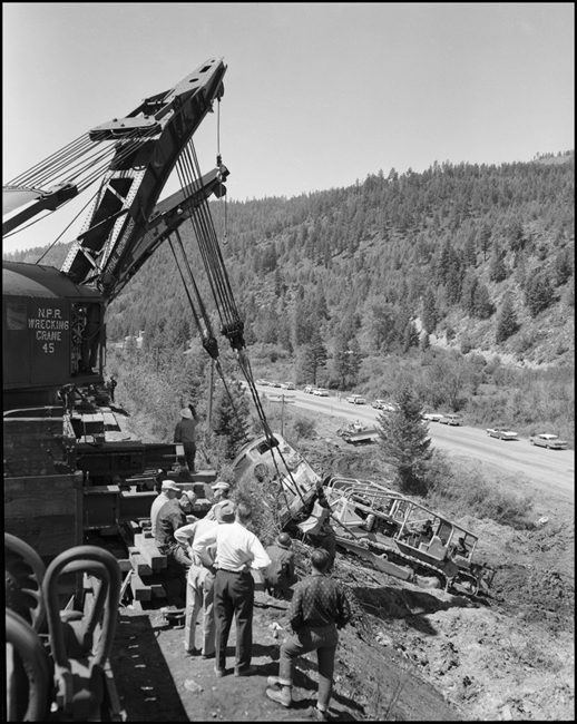 NP Wrecker #45 and another wrecker rerailing NP 6701C after the June 10th, 1962 accident.