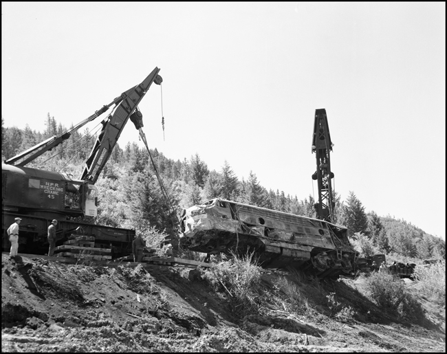 NP Wrecker #45 and another wrecker rerailing NP 6701C after the June 10th, 1962 accident.