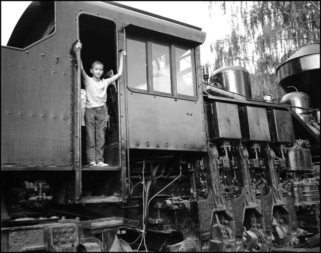 LDN, one of the Nixon Children or relatives in the cab of ACM 7 display at Bonner, MT.