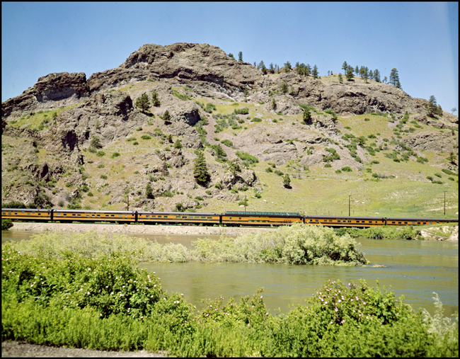 GN Passenger train No. 32  with dome car in center of photo near Craig, MT. 