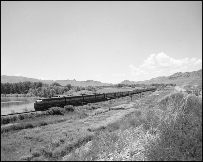 GN No. 32 passenger train with diesel power, near Cascade, MT.