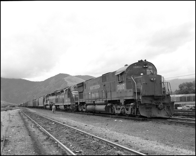 BN extra SP 7107W at Missoula, MT.  Second unit is in CBQ red paint and third unit is in GN sky blue.