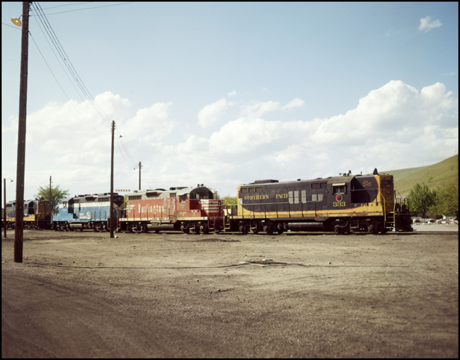 NP, CB&Q and GN road switcher power lined up at Missoula the summer after the merger that formed the Burlington Northern Railroad.