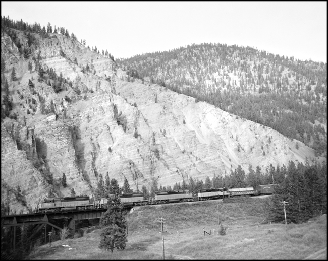 MILW No. 261, near Cyr, MT. Four diesel locomotives on train.