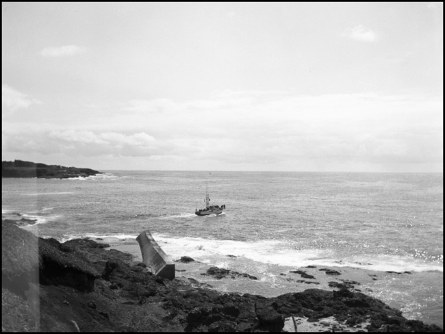 Photo is of a boat on the Pacific Ocean at Depoe Bay, OR.