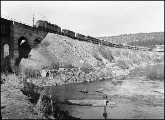 MILW # 261 on bridge near Nine Mile, with fisherman on the river.