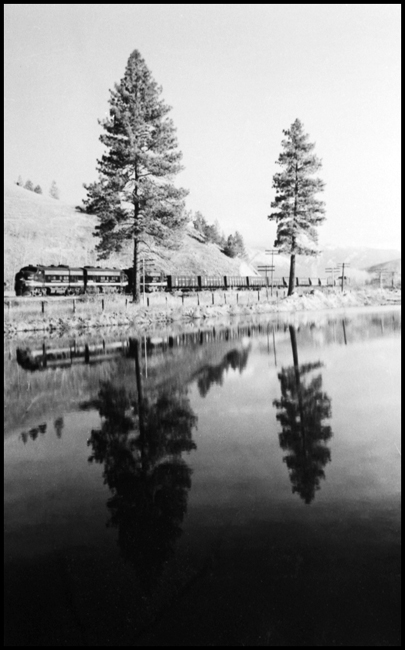 NP XW with reflection in river near Ravalli., MT