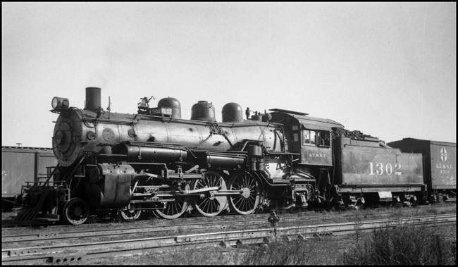 Atchison Topeka & Santa Fe Railroad # 1302, 4-6-2 at Dodge City, Kansas.