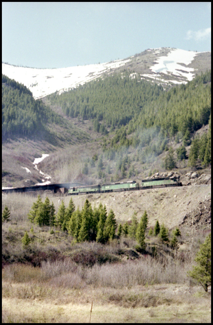 BN X6502E exiting a snow shed west of Marias, MT.