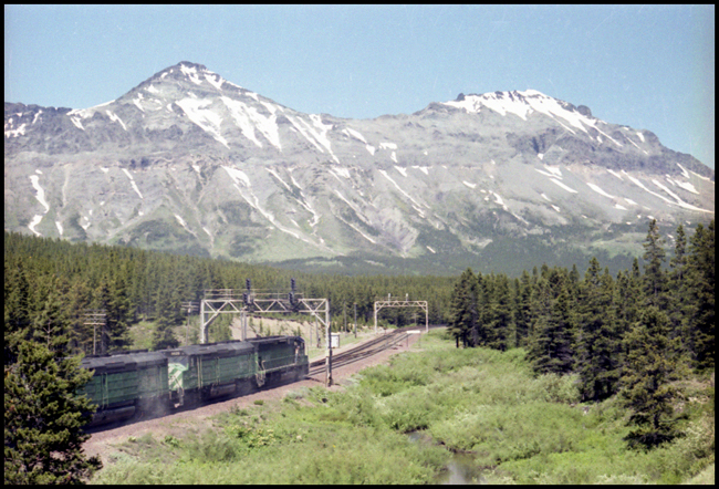 BN X6465- 6629-6634E with train No. 84 arriving Marias, MT.