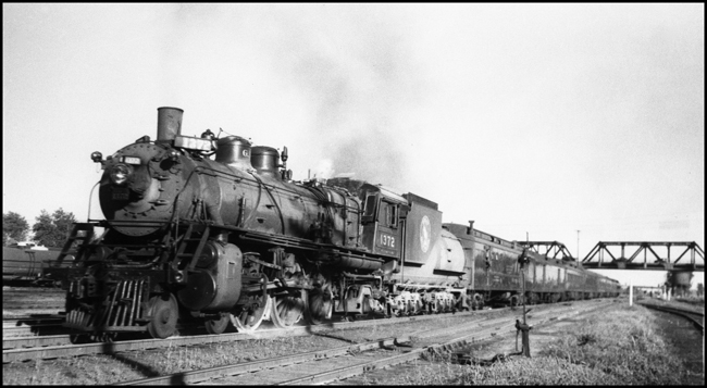 GN 1372, a 4-6-0 heading a passenger train at Northtown, Minnesota.