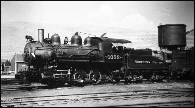 NP 1033, 0-6-0 6-Coupled SW Class L-7  in the yard at Missoula, Montana.