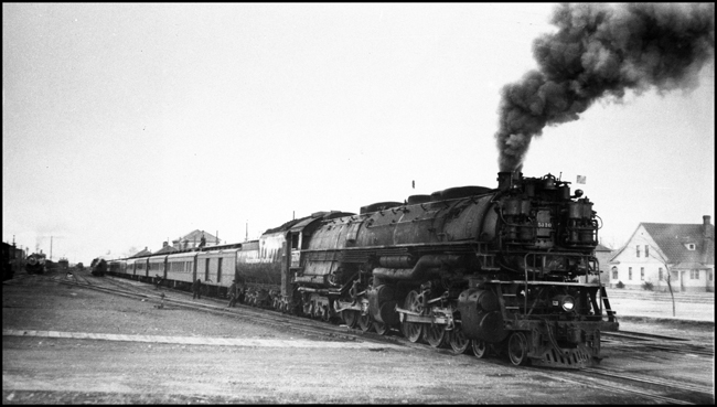 NP 5110, a 4-6-6-4 Challenger Class Z-6 stopped with second train No. 1 the NCL at Livingston, Montana.