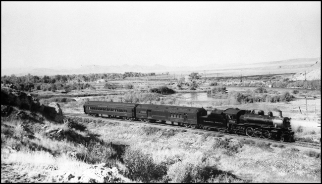 NP 2213, a 4-6-2 Pacific Class Q-4, is pulling a short train No. 221 east of Trident, Montana.