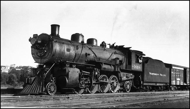 NP 1608, a 2-8-2 Mikado Class W, with a stock train at St. Paul, Minnesota.